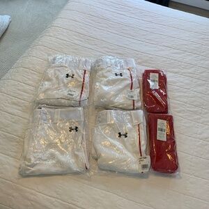 Bundle set of 4 boys baseball pants with red stripe and 2 pairs of red socks.